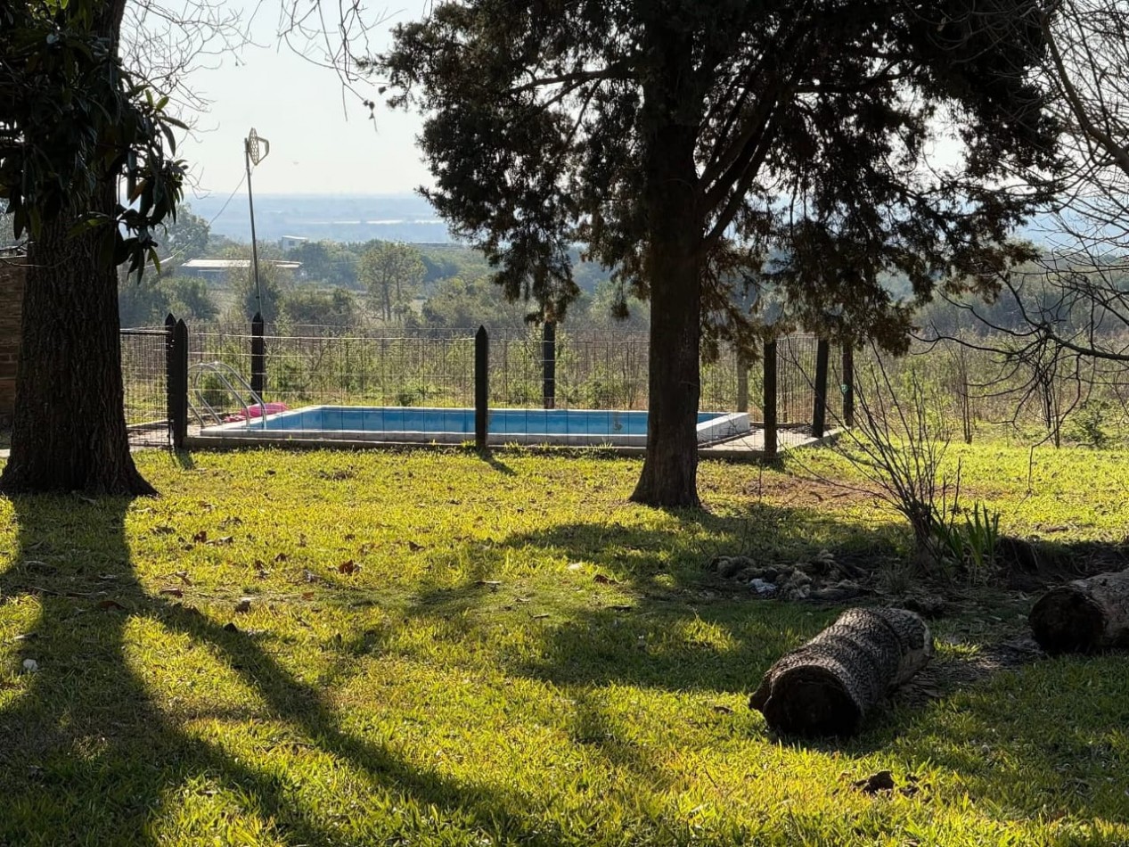 VENTA DE CASA DE CAMPO EN  AMPLIO LOTE EN PUERTO ALVEAR