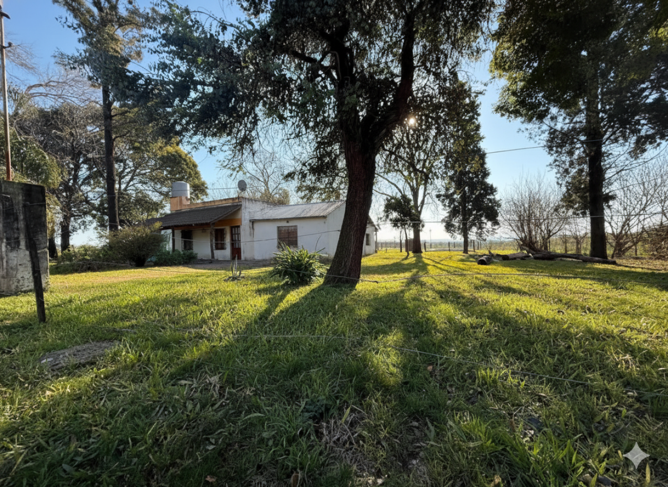 VENTA DE CASA DE CAMPO EN  AMPLIO LOTE EN PUERTO ALVEAR