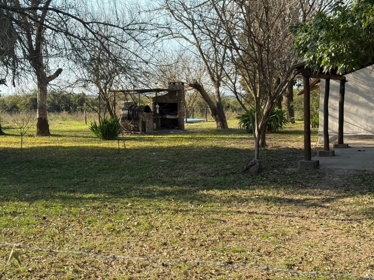 VENTA DE CASA DE CAMPO EN  AMPLIO LOTE EN PUERTO ALVEAR